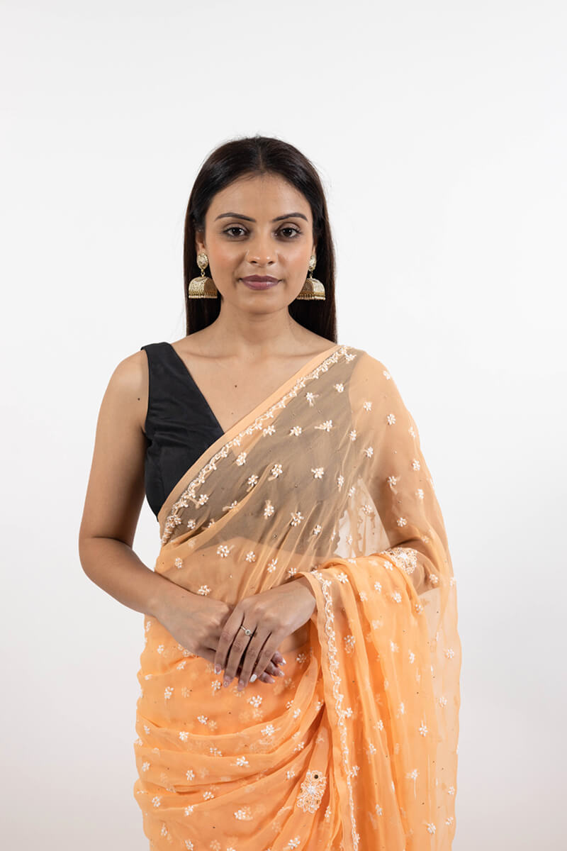 Orange Georgette Saree with Mukesh Work & White Chikankari Embroidery