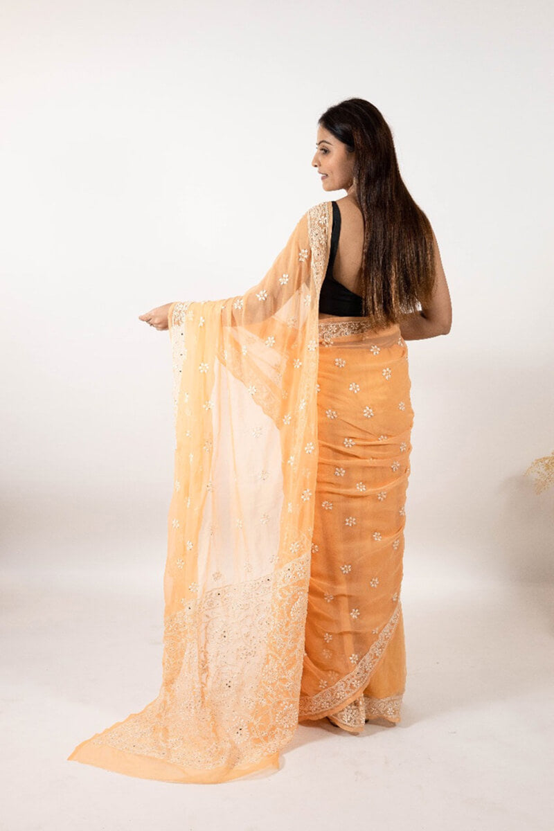 Orange Georgette Saree with Mukesh Work & White Chikankari Embroidery