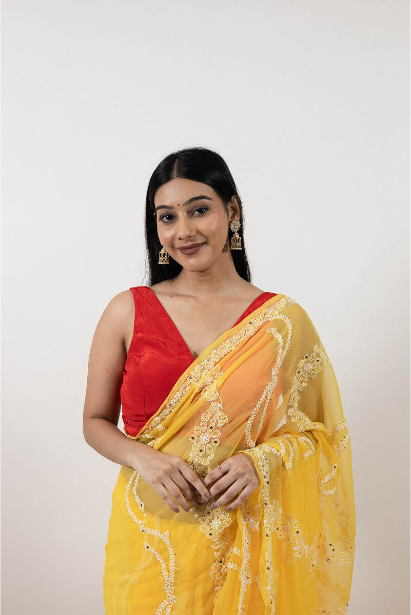 Yellow Georgette Saree with Mukesh Work & White Chikankari Embroidery